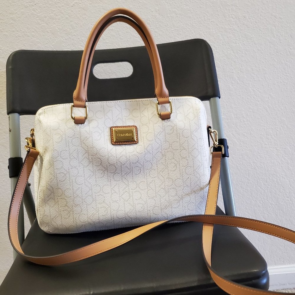 Like New!!  Calvin Klein precious bag.